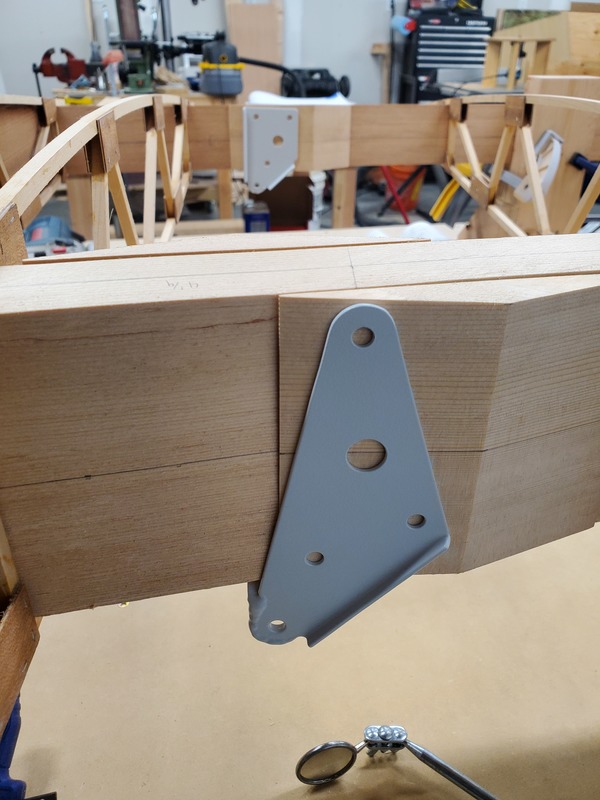 The forward cabane bracket is shown with wedge blocks, on the
forward wing spar