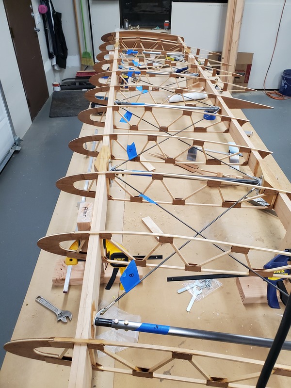 Photograph of a skeletal biplane wing structure on a
workbench