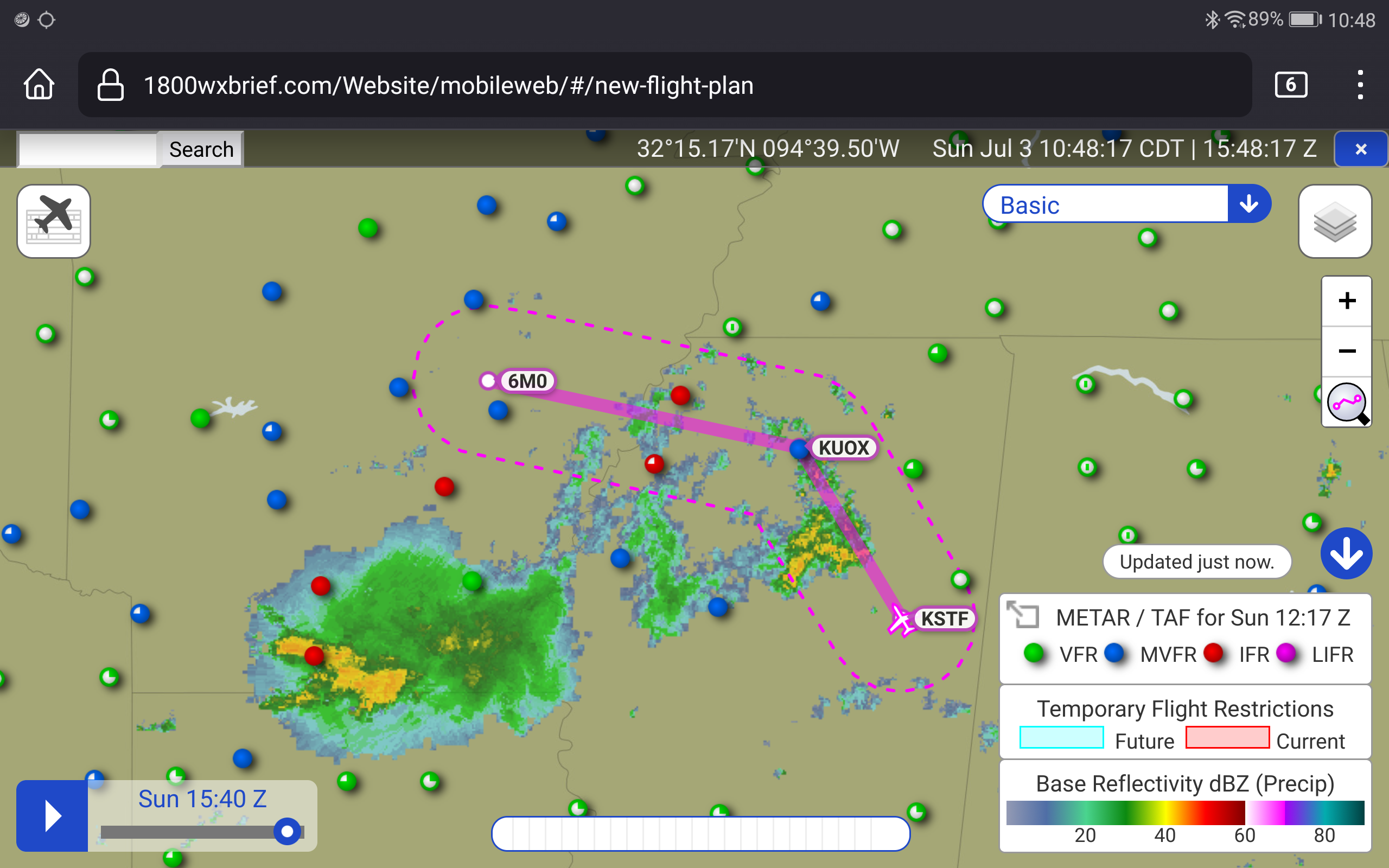 Screenshot of a weather map, which shows a big nasty-looking blob of
color to the southwest from the depicted flight path, which is a sort of
boomerang shape from the southeast to the northwest.